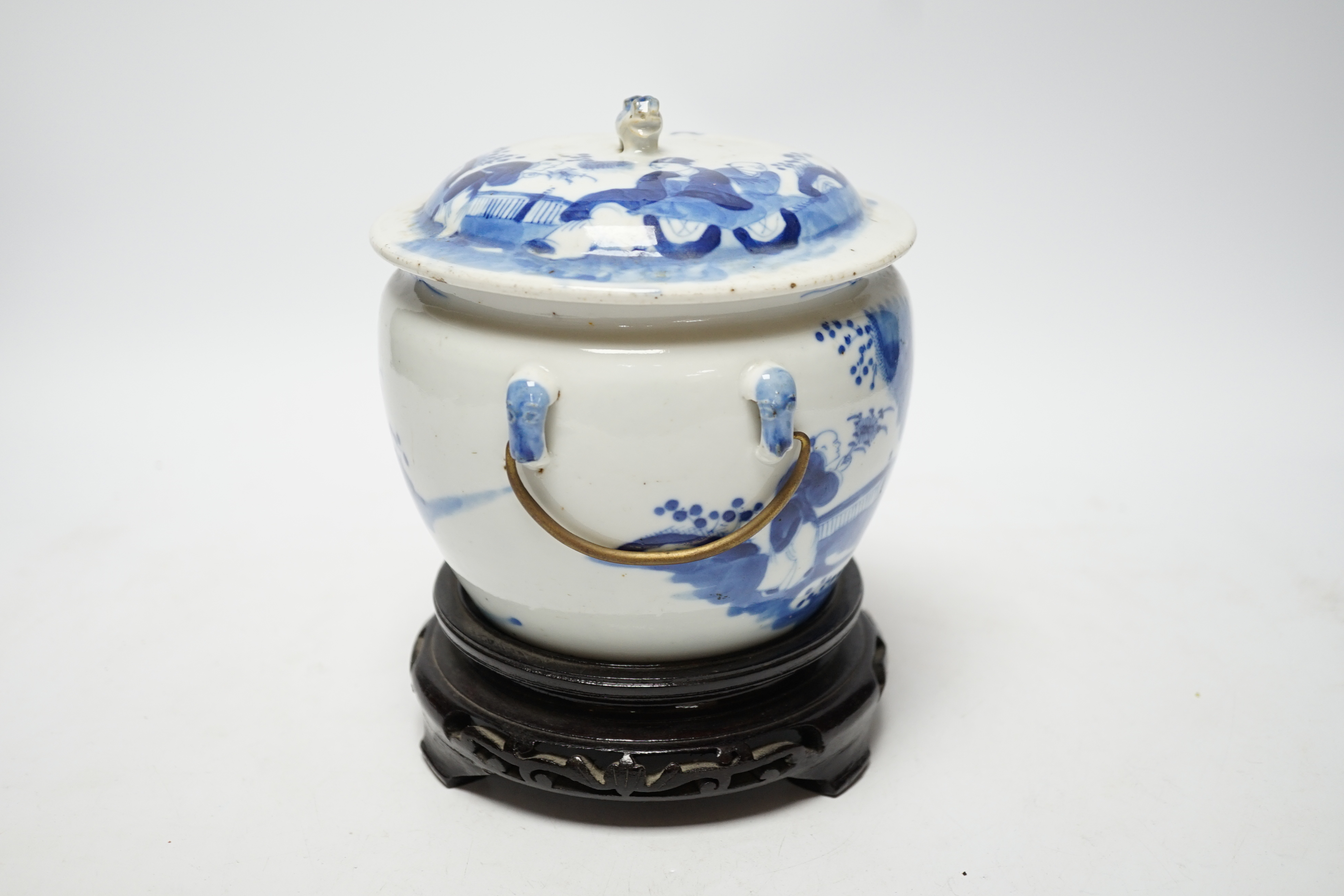 A Chinese Straits blue and white bowl and cover, kamcheng, late 19th century, with twin handles, on hardwood stand, 19cm high